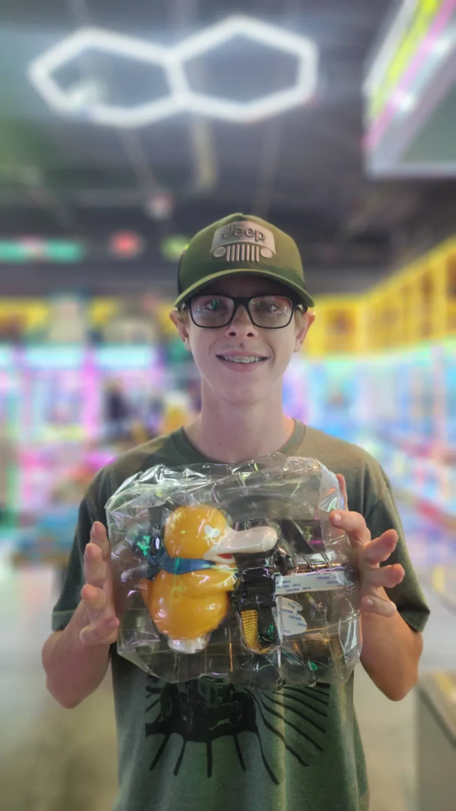 Guest with a wrapped prize bundle