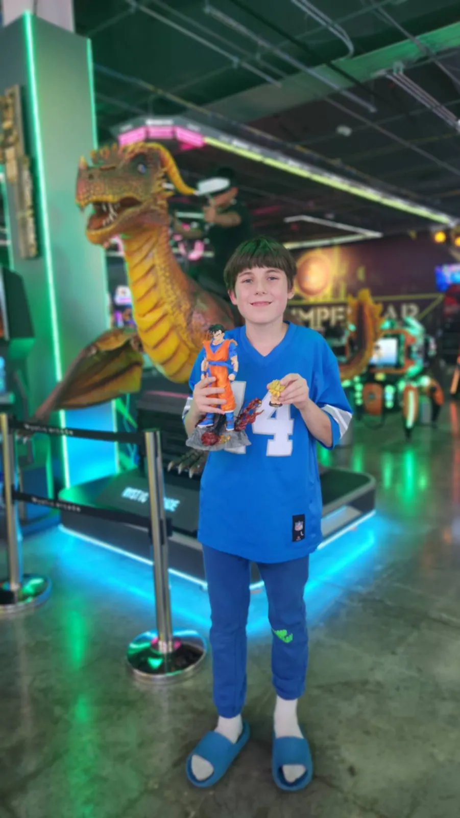 Young guest by the dragon ride