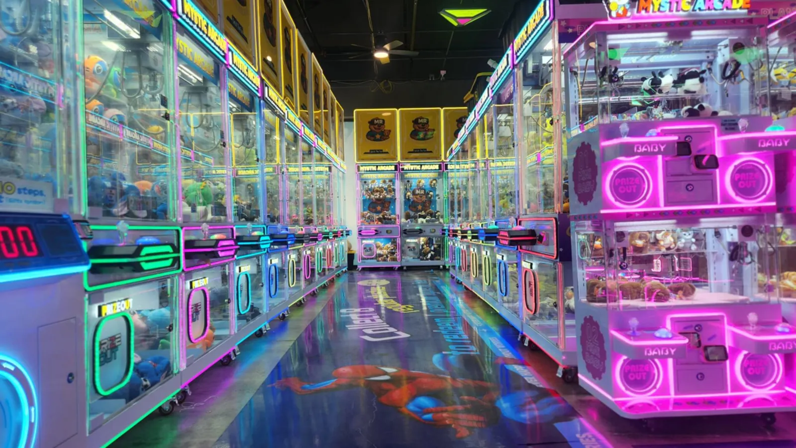Claw machine aisle glowing pink