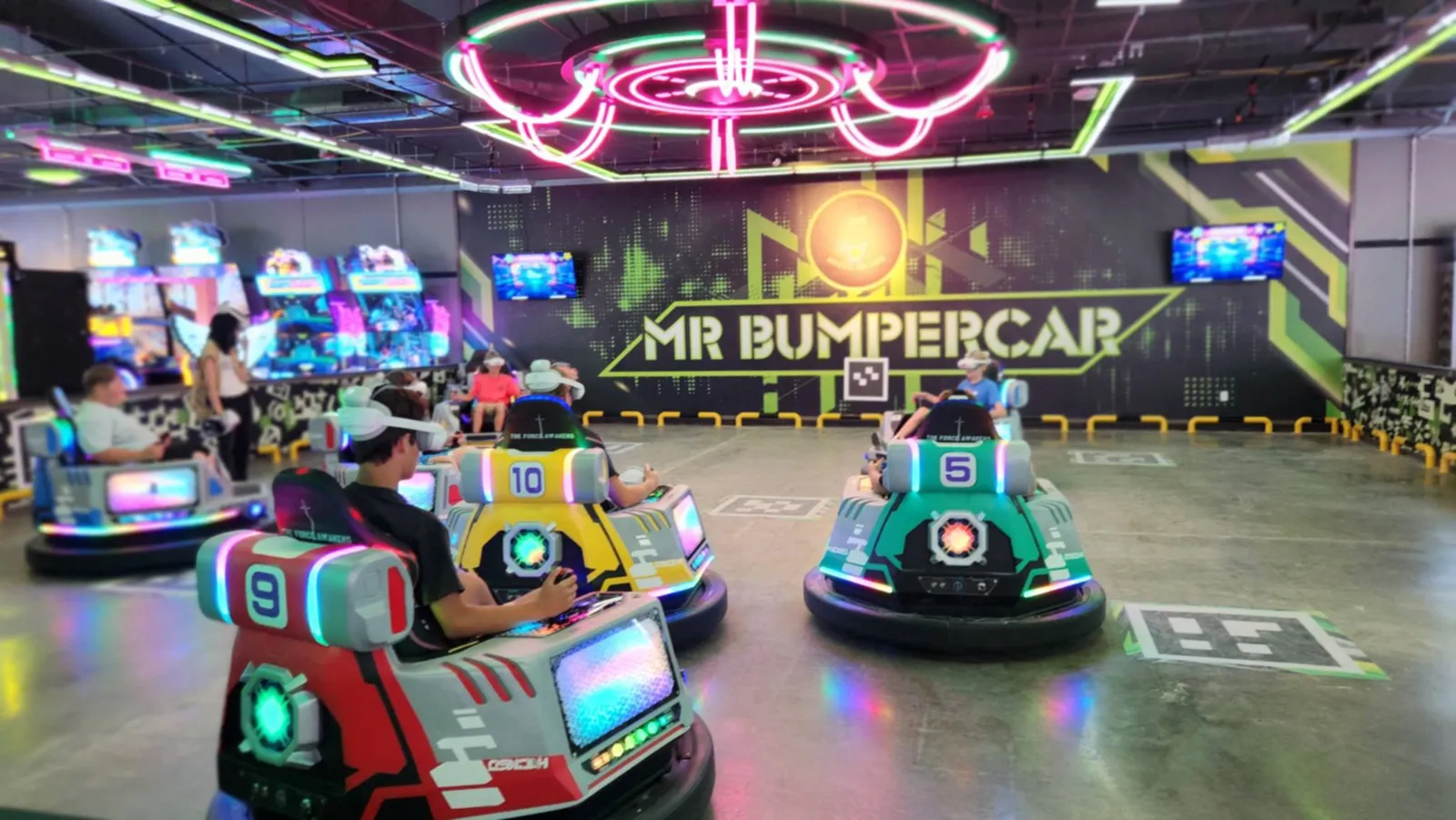 Guests riding the VR bumper cars